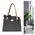 Black and white polka dot handbag with a bow