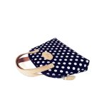 Navy blue and white polka dot cosmetic bag